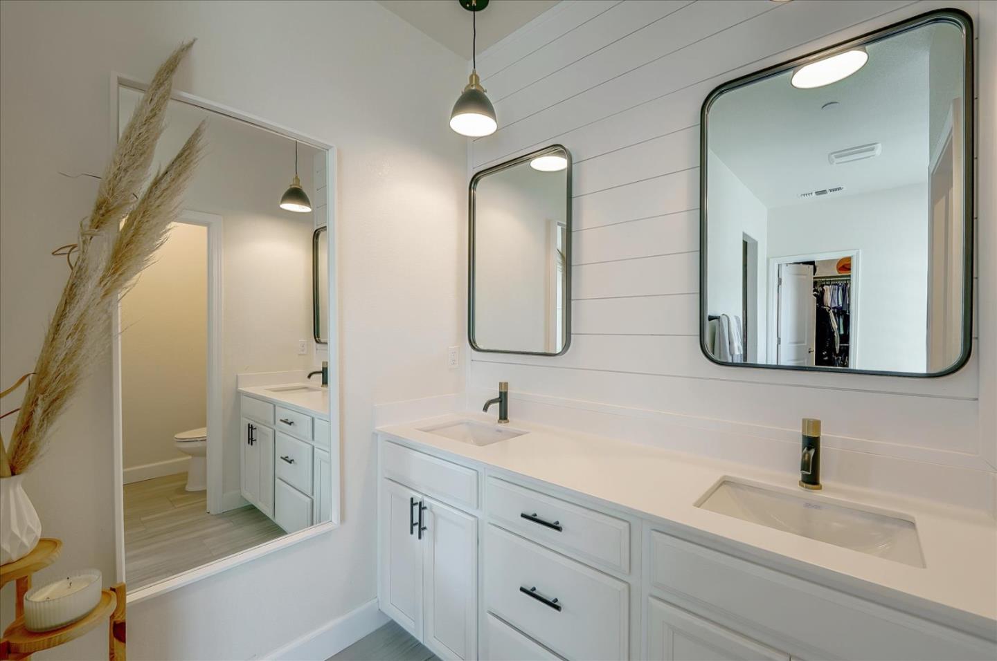 2580 Apple Tree Way Gilroy, CA 95020 - Photo 34 of 45 a bathroom with a double vanity sink mirror and toilet