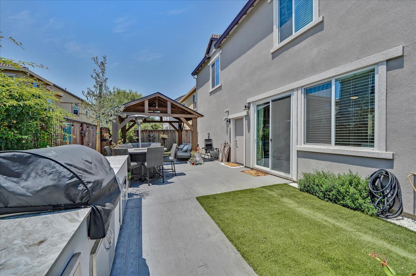 2580 Apple Tree Way Gilroy, CA 95020 - Photo 38 of 45 a view of a house with backyard porch and sitting area