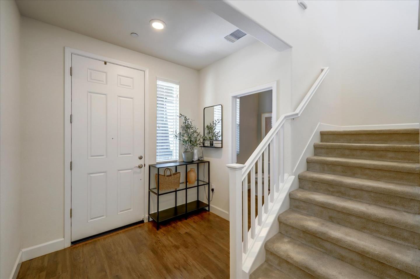 2580 Apple Tree Way Gilroy, CA 95020 - Photo 6 of 45 a view of entryway with wooden floor and stairs