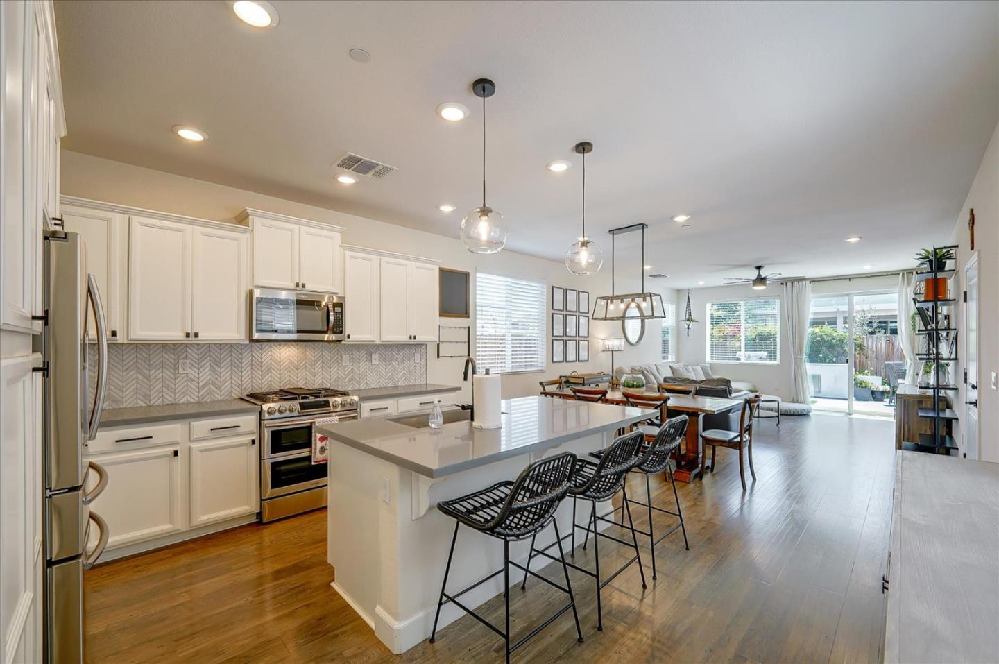 2580 Apple Tree Way Gilroy, CA 95020 - Photo 10 of 45 a large kitchen with a table and chairs