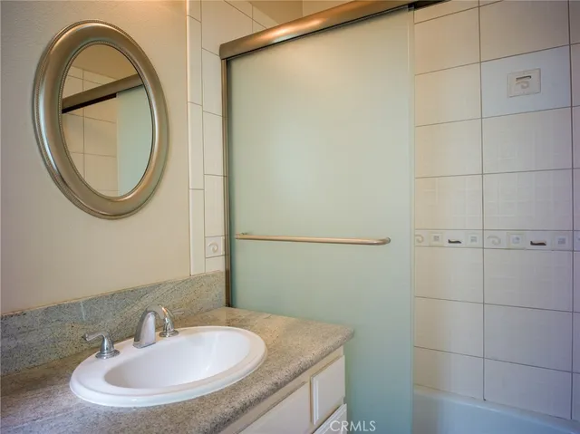 a view of entryway with a table and a chandelier