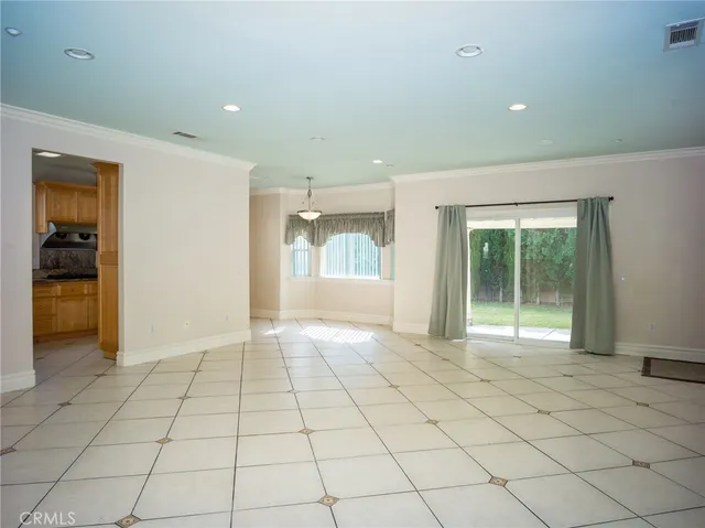 a view of an empty room and window