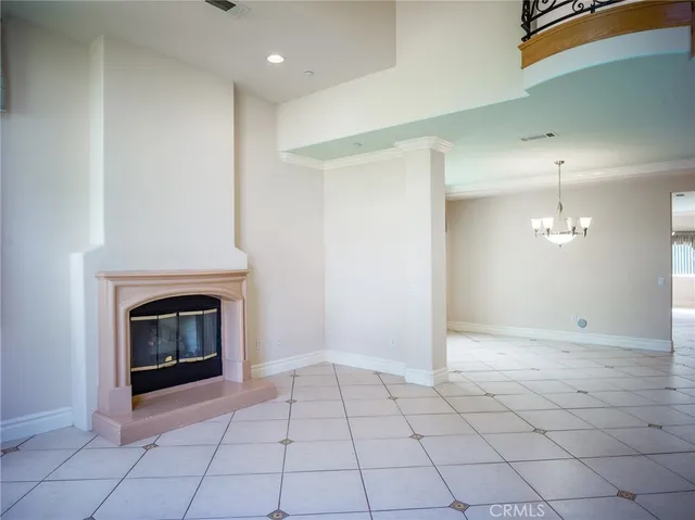 a view of an empty room and closet area