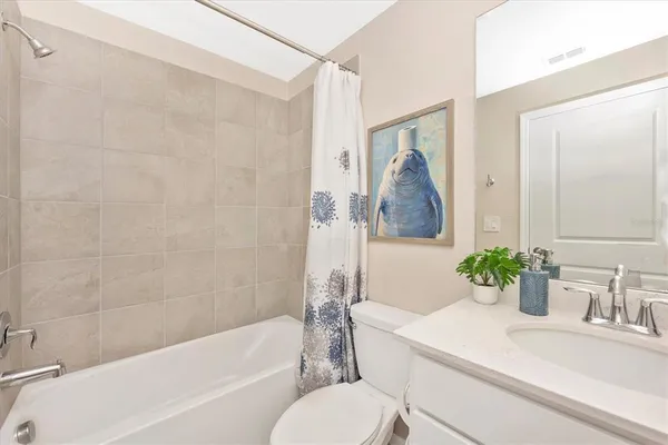 a building outdoor space with patio furniture and potted plants