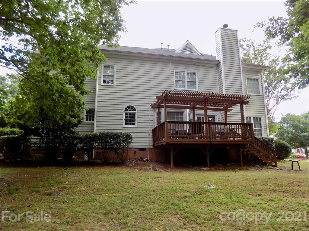 112 Comata Road Mooresville, NC 28117 - Photo 14 of 14 a view of a house with a back yard
