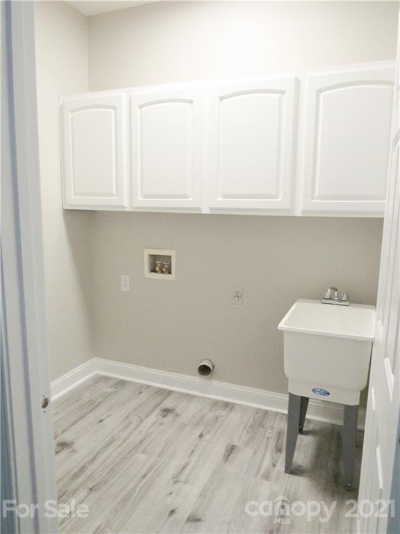 112 Comata Road Mooresville, NC 28117 - Photo 6 of 14 a room with cabinets