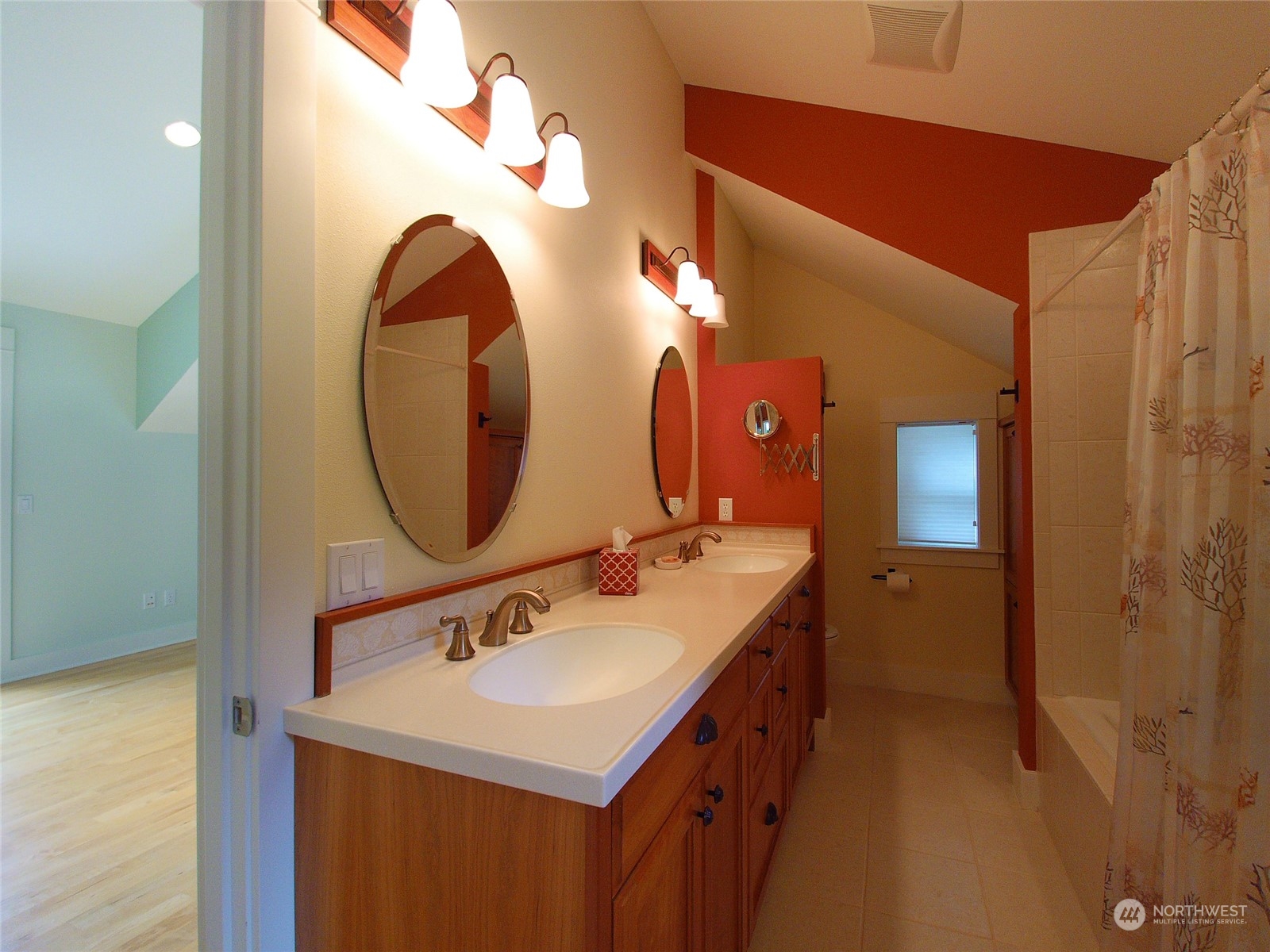 308 Lake Sutherland Road Port Angeles, WA 98363 - Photo 14 of 40 a bathroom with a sink and a mirror