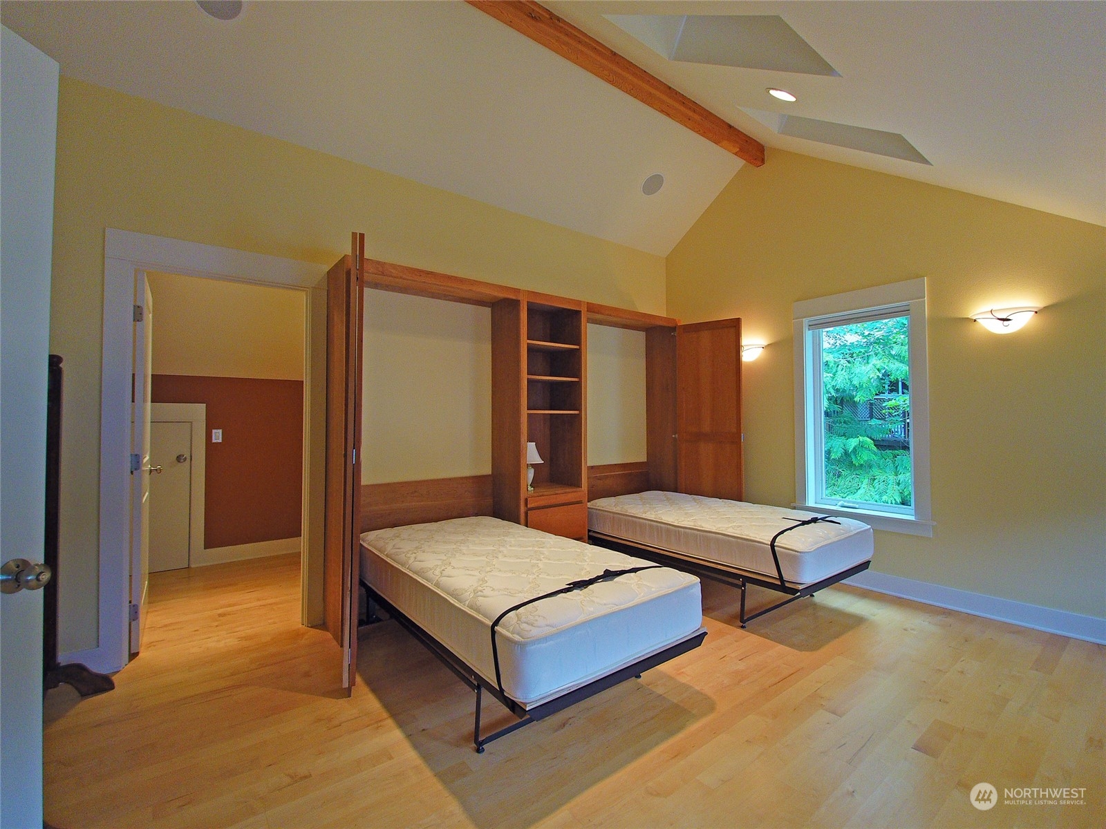 308 Lake Sutherland Road Port Angeles, WA 98363 - Photo 19 of 40 a bedroom with a bed and window