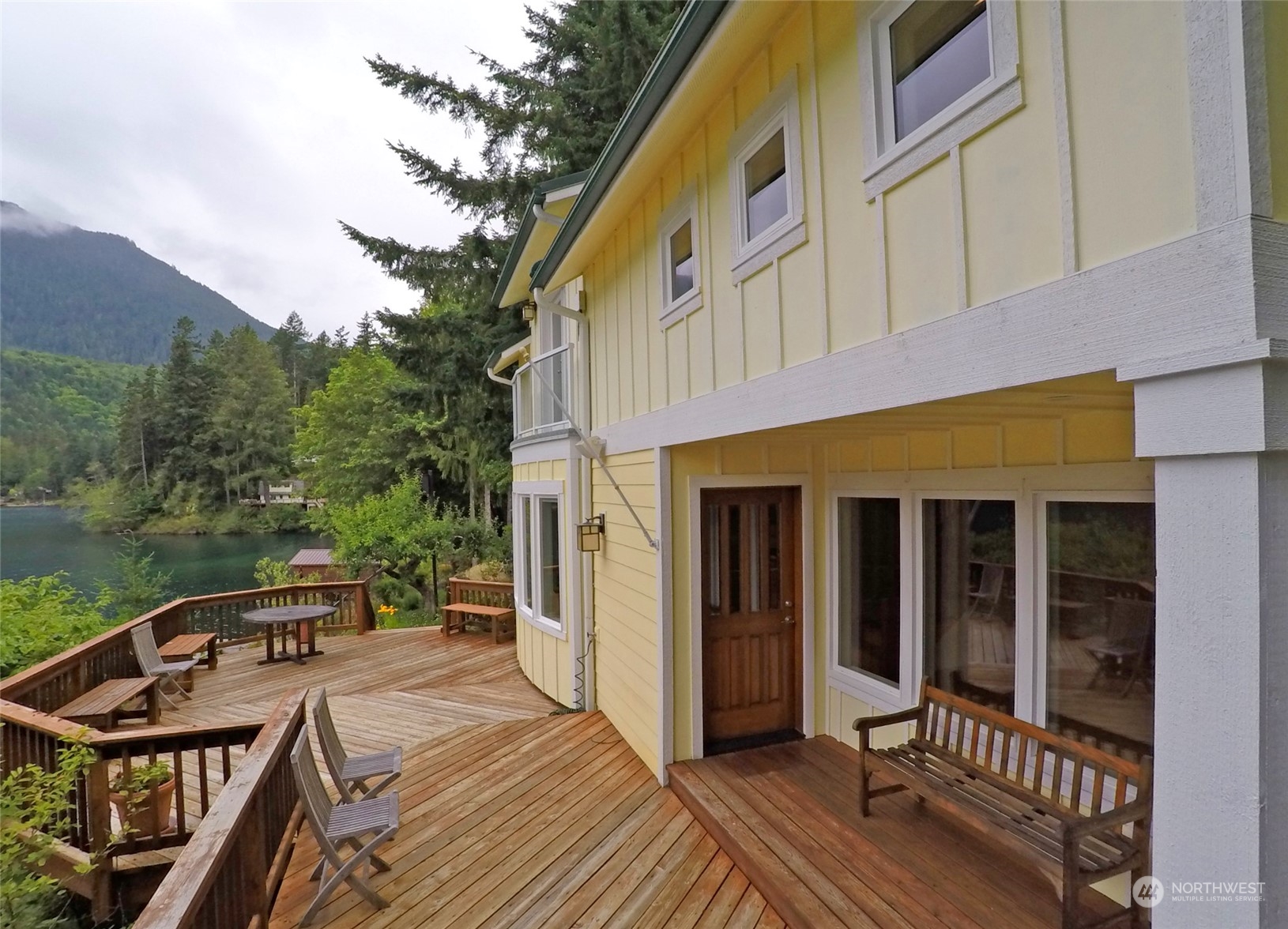 308 Lake Sutherland Road Port Angeles, WA 98363 - Photo 25 of 40 a balcony view with a seating space