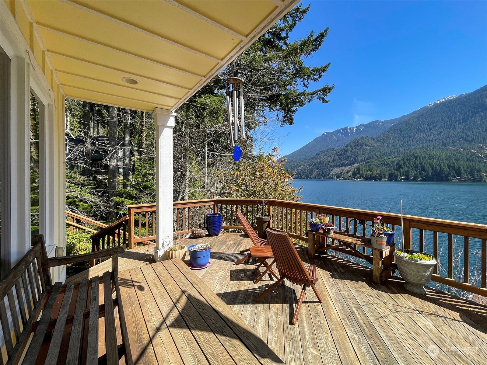 308 Lake Sutherland Road Port Angeles, WA 98363 - Photo 3 of 40 a view of balcony with furniture and wooden floor