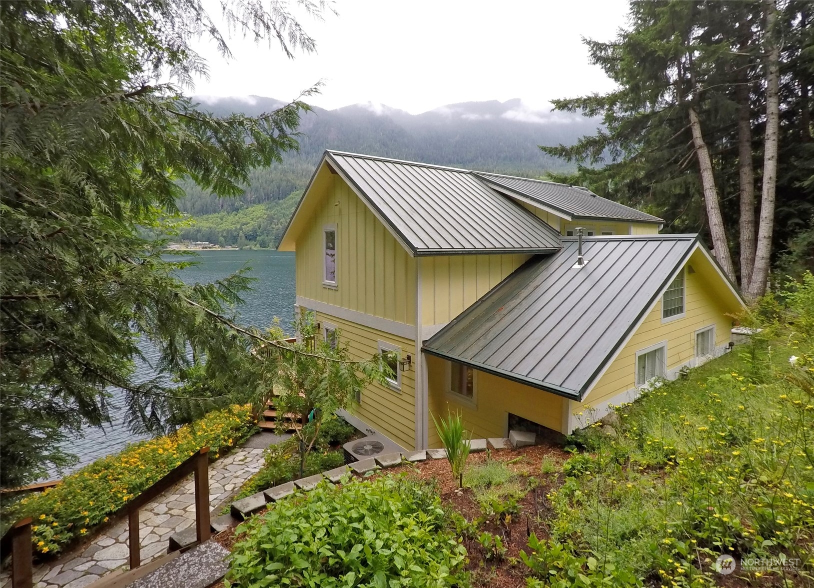 308 Lake Sutherland Road Port Angeles, WA 98363 - Photo 36 of 40 a aerial view of a house with a yard