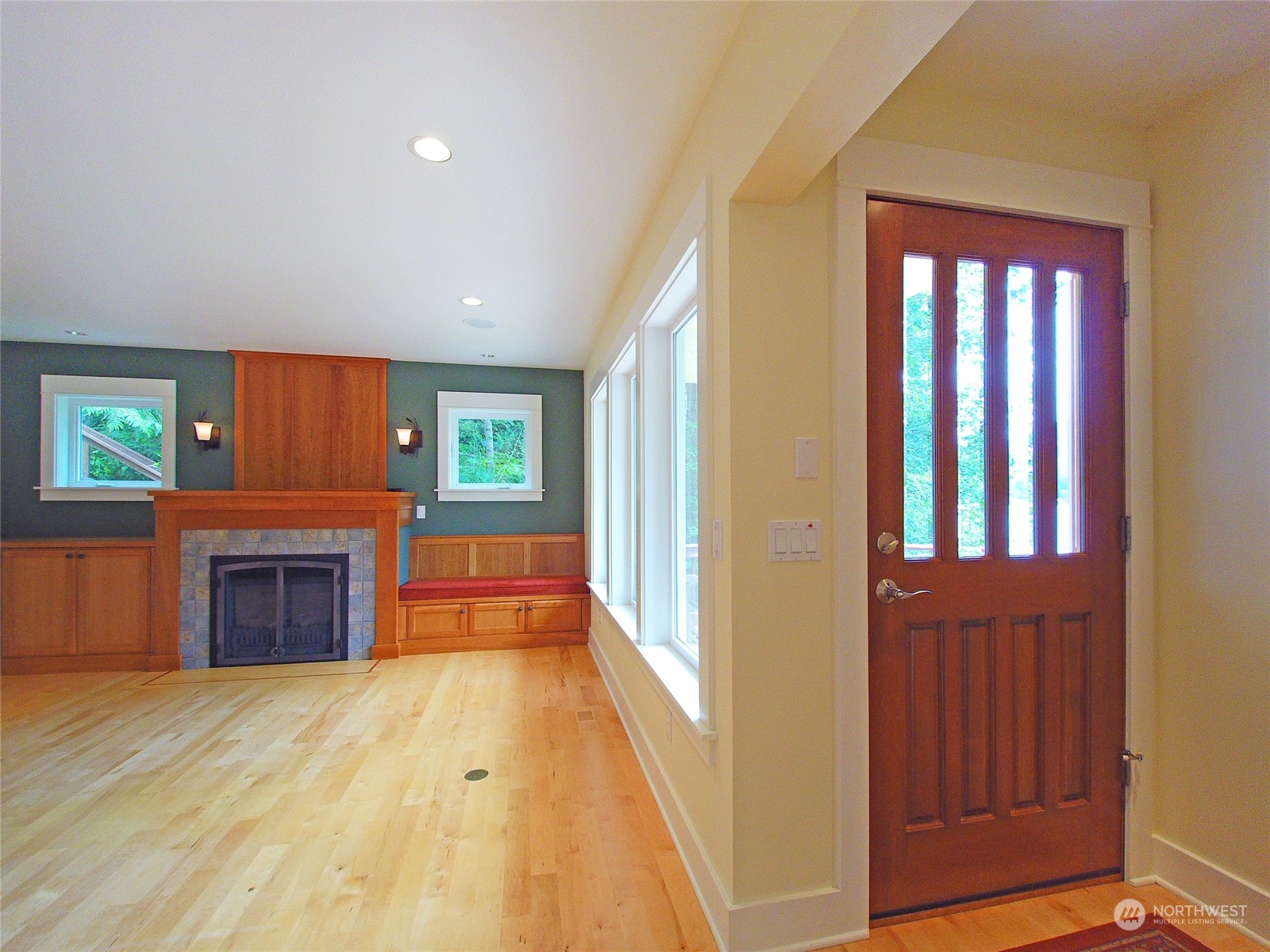 308 Lake Sutherland Road Port Angeles, WA 98363 - Photo 6 of 40 a view of an entryway with a fireplace