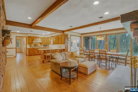 a living room with furniture and a table