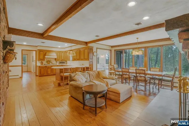 a living room with furniture and a table