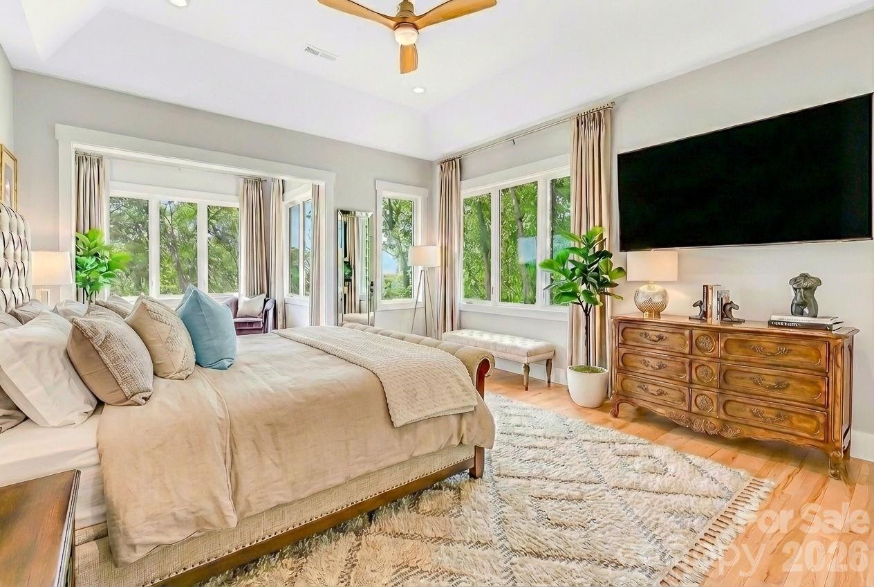 128 Saddle Ridge Drive Alexander, NC 28701 - Photo 14 of 33 a bedroom with a bed and flat screen tv