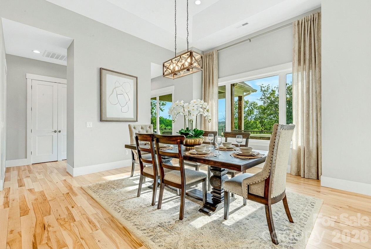 128 Saddle Ridge Drive Alexander, NC 28701 - Photo 8 of 33 a view of a dining room with furniture window and outside view
