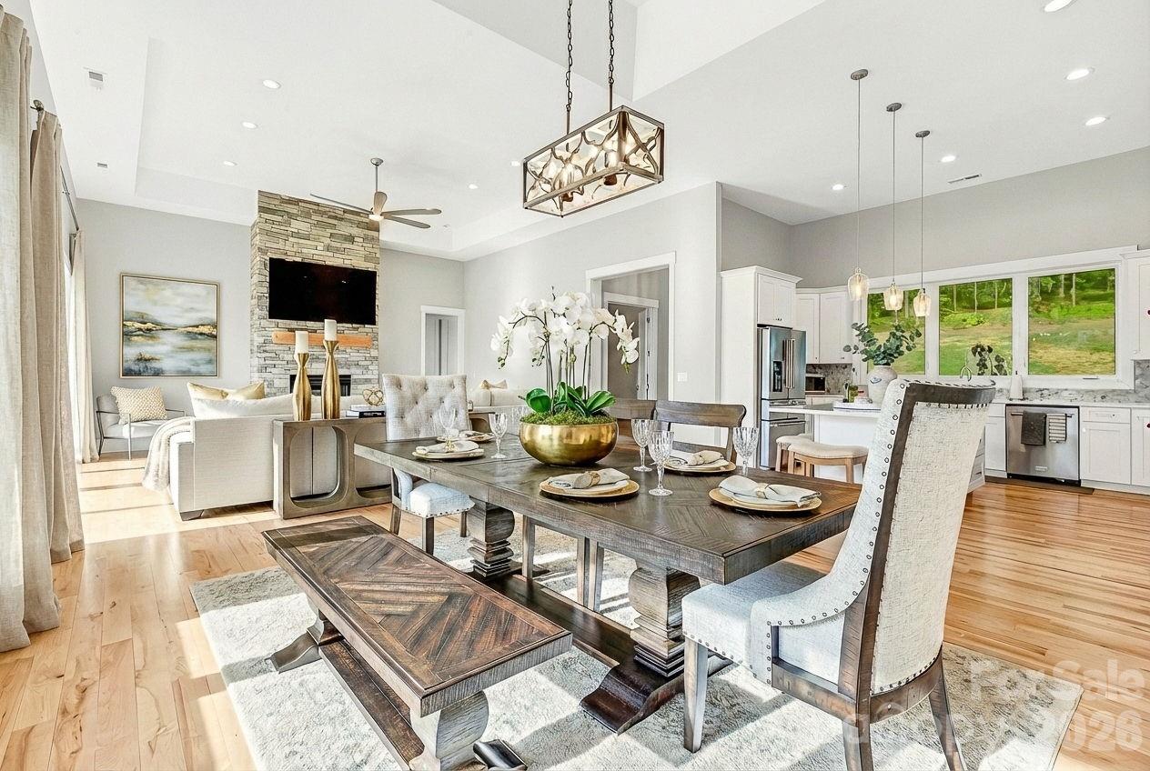 128 Saddle Ridge Drive Alexander, NC 28701 - Photo 10 of 33 a view of a dining room with furniture window and outside view