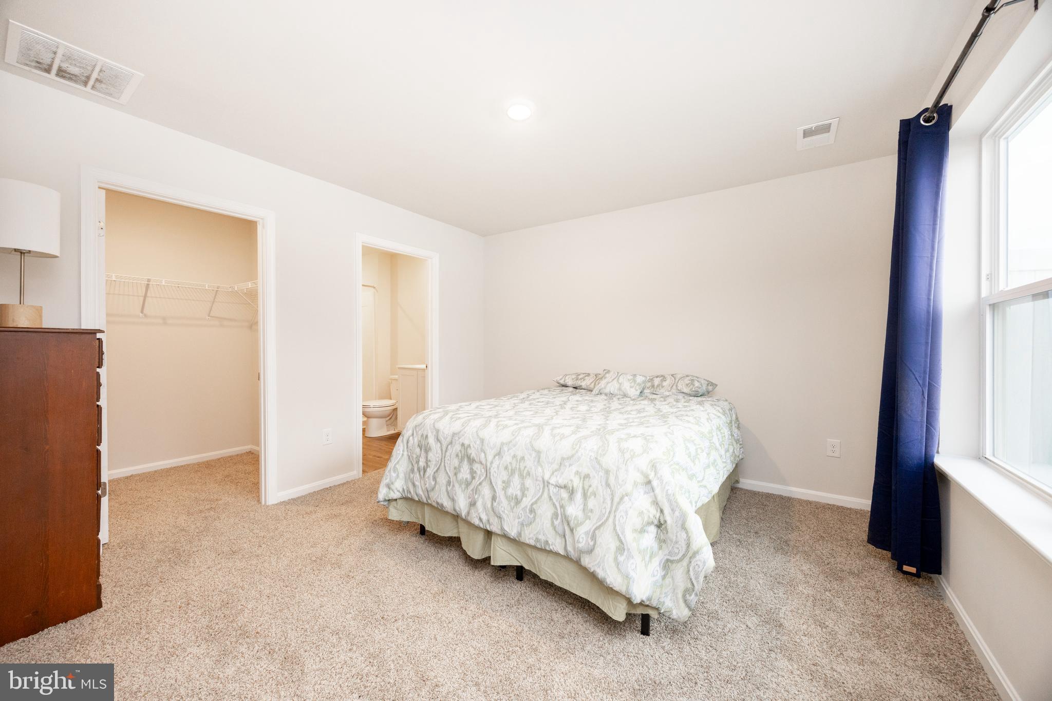 21 Clipper Street Smyrna, DE 19977 - Photo 16 of 39 a bed sitting in a room next to a window