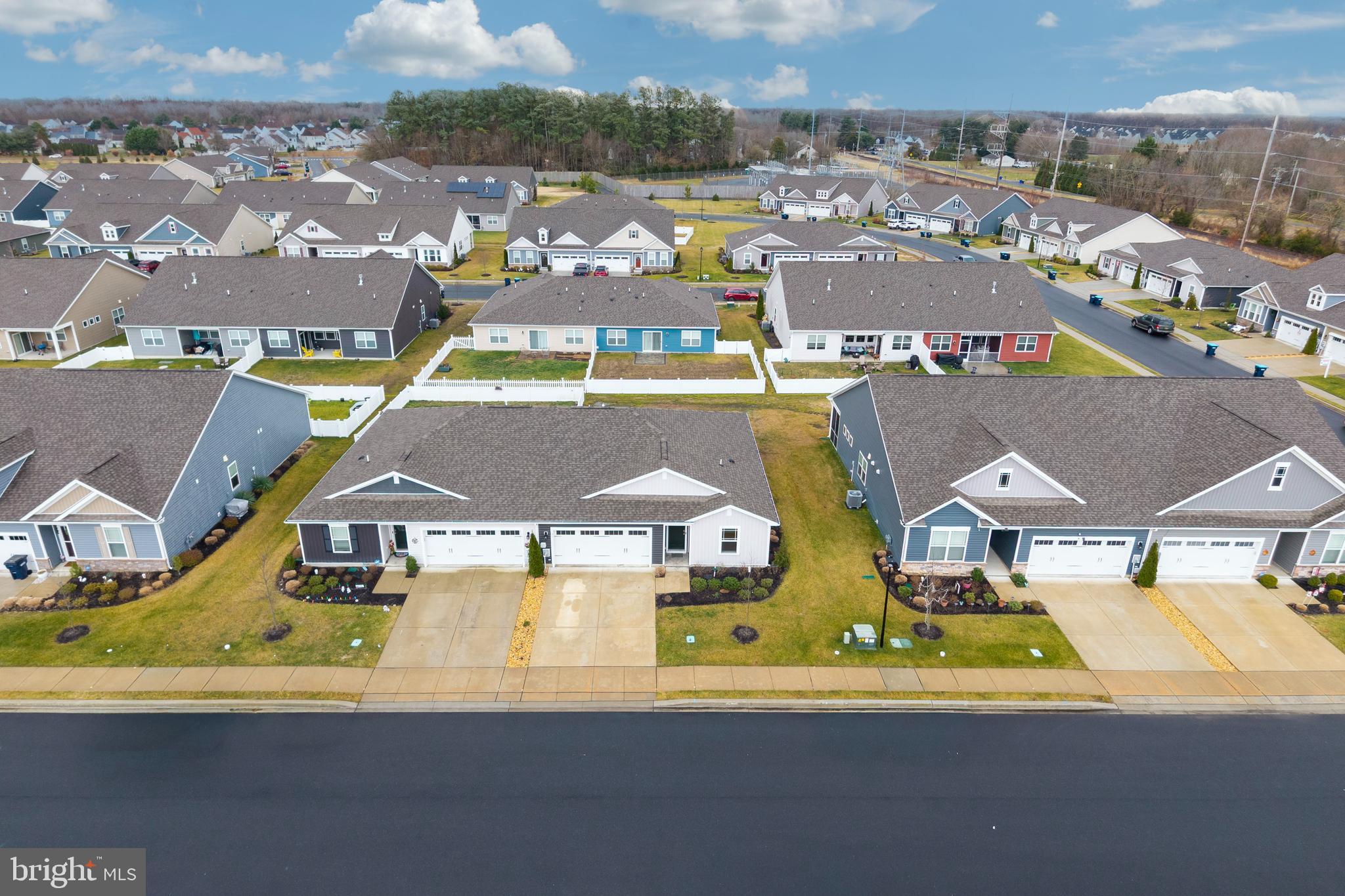 21 Clipper Street Smyrna, DE 19977 - Photo 35 of 39 an aerial view of residential houses with outdoor space and parking