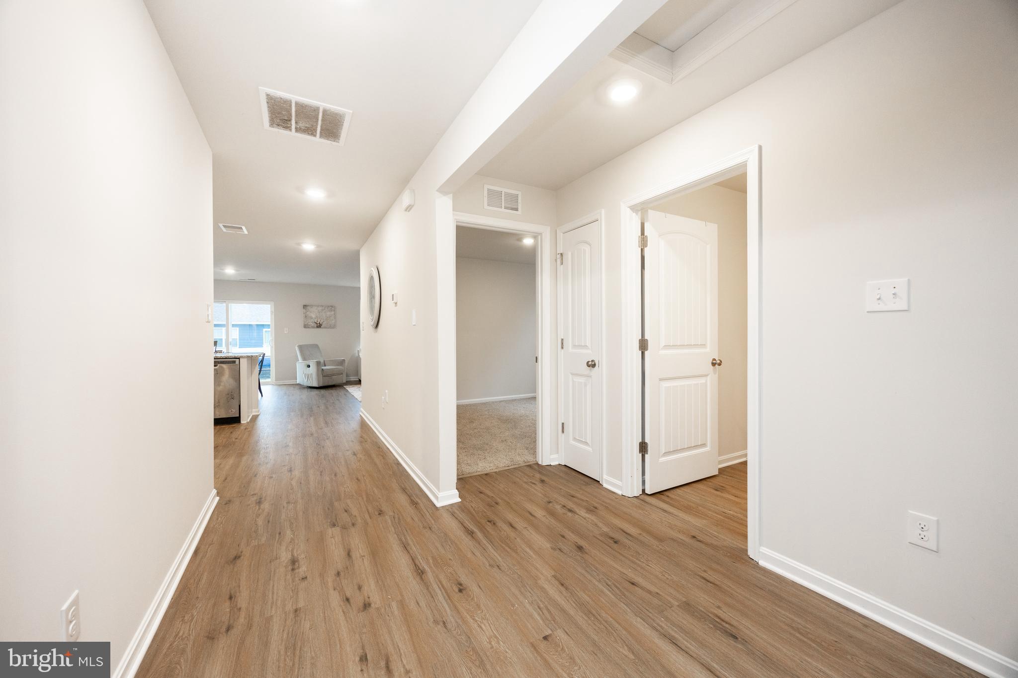 21 Clipper Street Smyrna, DE 19977 - Photo 5 of 39 a view of a hallway with wooden floor
