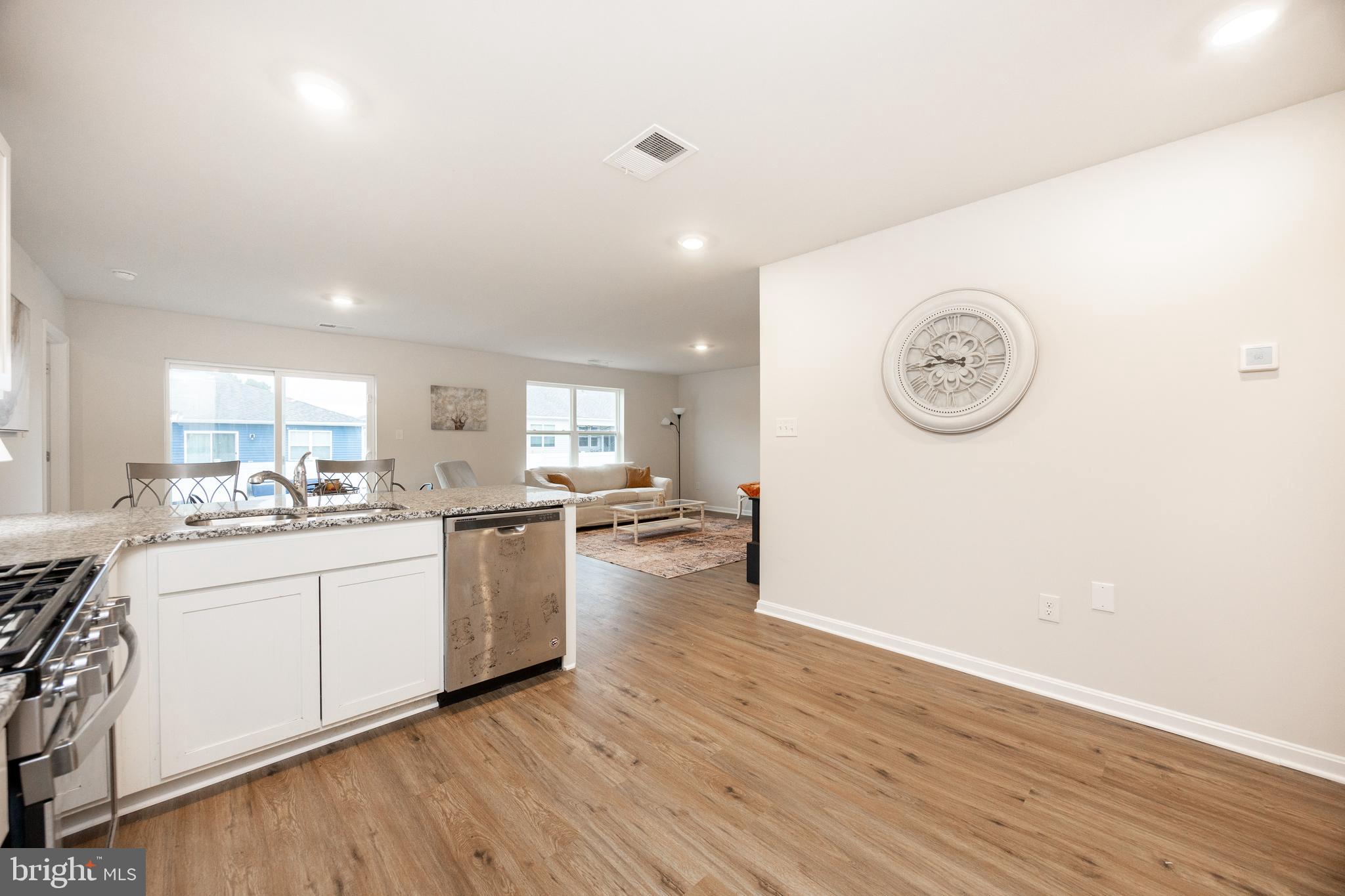 21 Clipper Street Smyrna, DE 19977 - Photo 8 of 39 a kitchen with a refrigerator and a stove