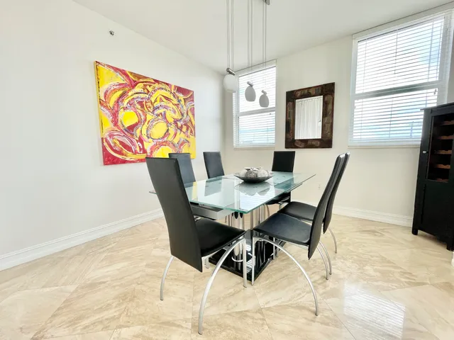 a bedroom with bed and window