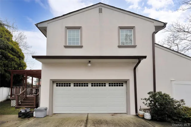 a view of a house with a garage