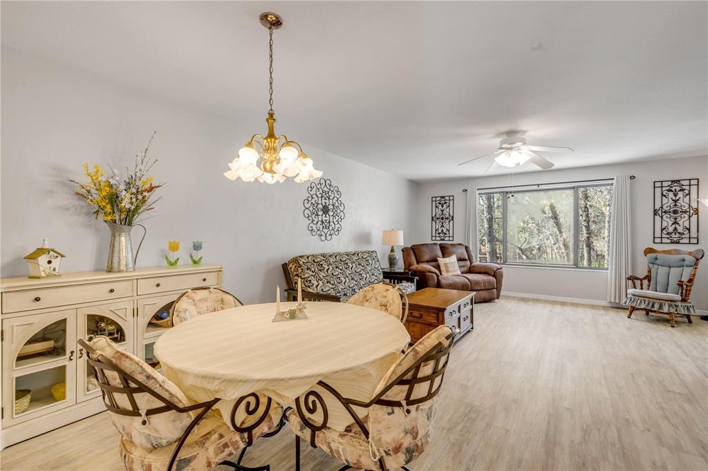 47 Crooked Pine Road Port Orange, FL 32128 - Photo 11 of 41 a view of a dining room with furniture window and outside view