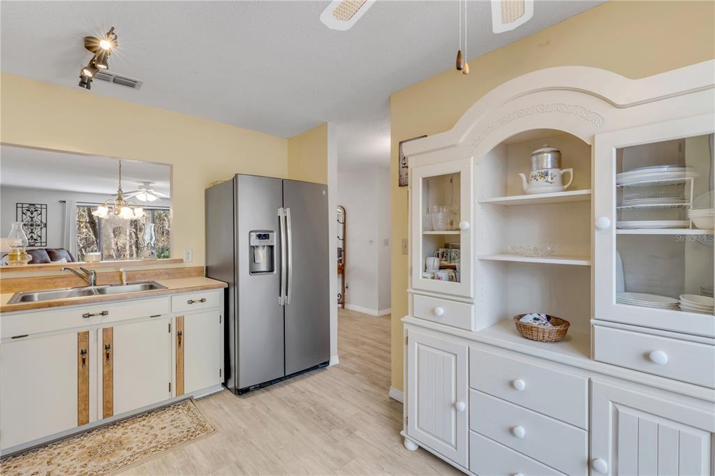 47 Crooked Pine Road Port Orange, FL 32128 - Photo 15 of 41 a view of a hallway with washer and dryer