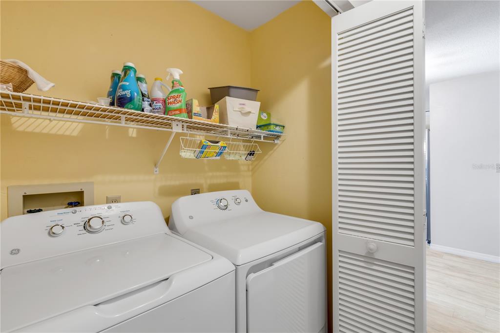 47 Crooked Pine Road Port Orange, FL 32128 - Photo 27 of 41 a utility room with dryer and washer