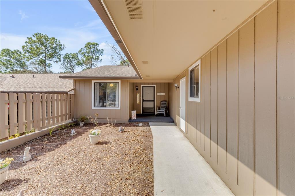 47 Crooked Pine Road Port Orange, FL 32128 - Photo 3 of 41 a front view of a house with a porch