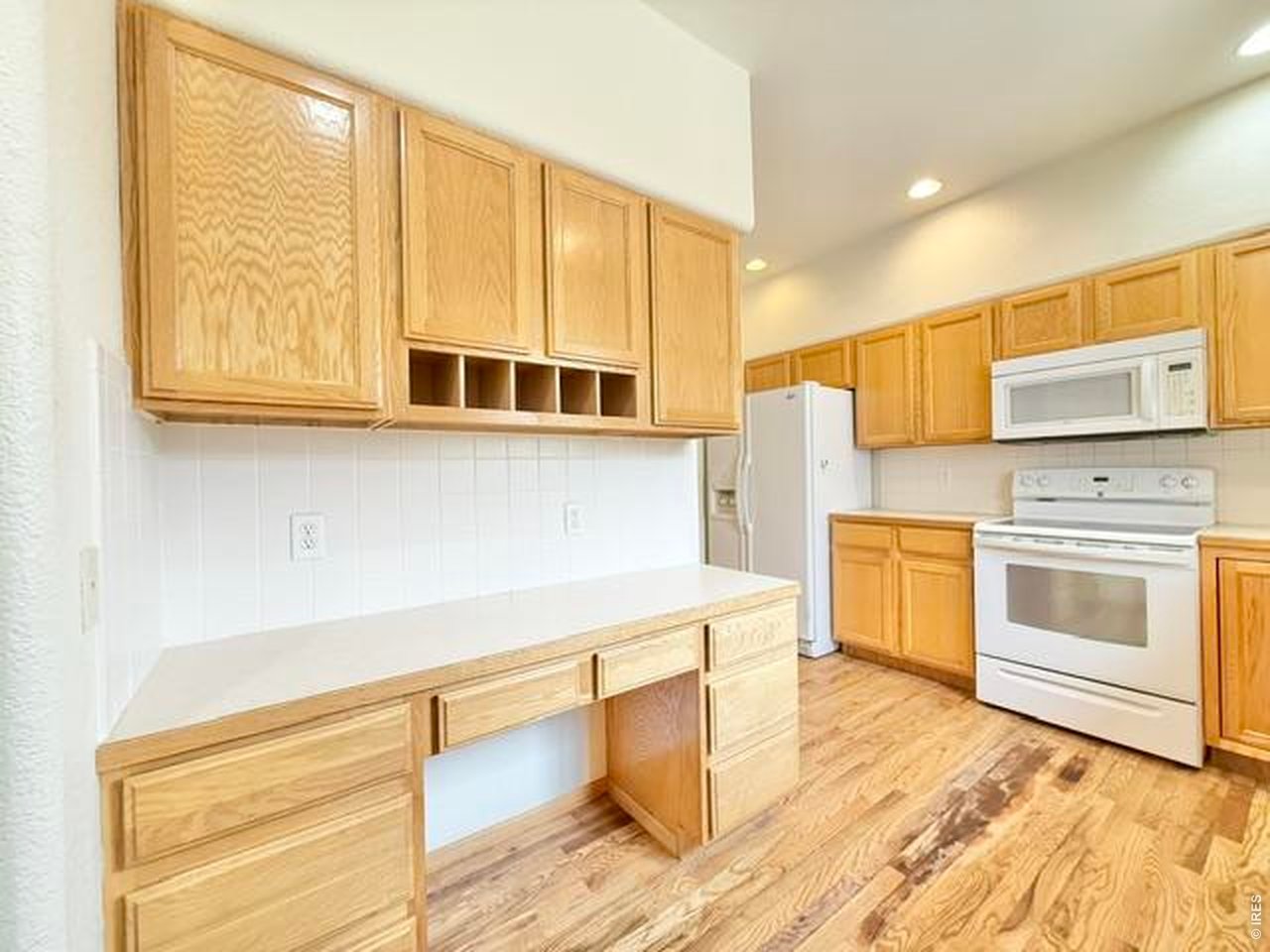 5627 West 16th Street Road Greeley, CO 80634 - Photo 8 of 20 kitchen with built in desk