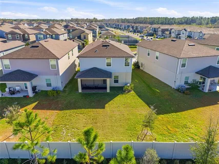 an aerial view of a house with a garden