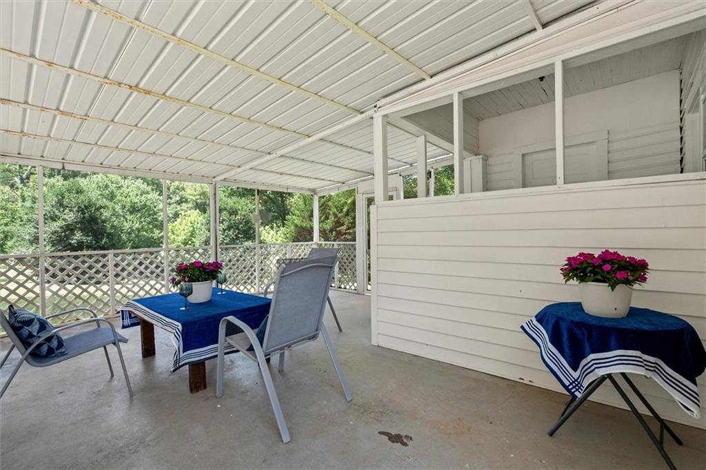 1423 Beulah Church Road Carrollton, GA 30117 - Photo 22 of 31 a outdoor space with a table and chairs