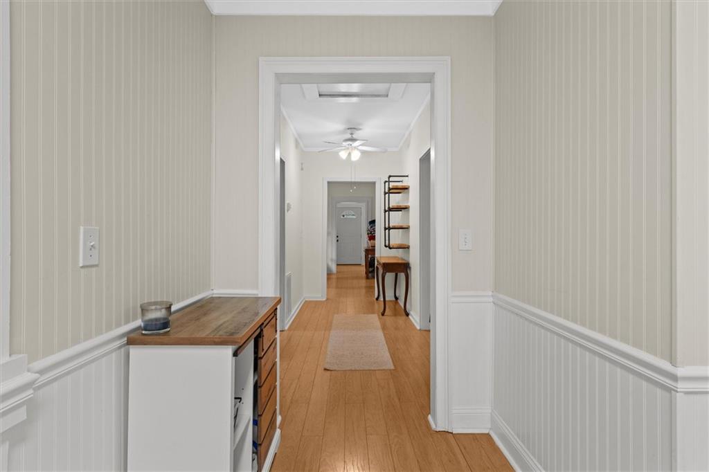 1423 Beulah Church Road Carrollton, GA 30117 - Photo 10 of 31 a hallway with a wooden floor