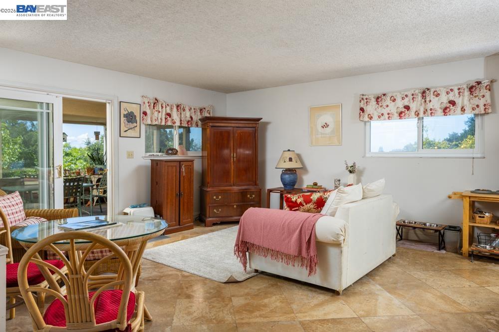 4591 Edwards Lane Castro Valley, CA 94546 - Photo 15 of 44 a bedroom with a bed and a table