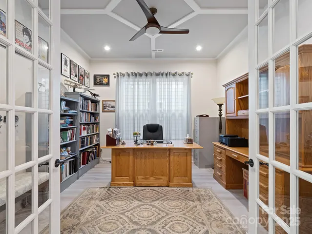 a view of a livingroom with furniture and a fireplace