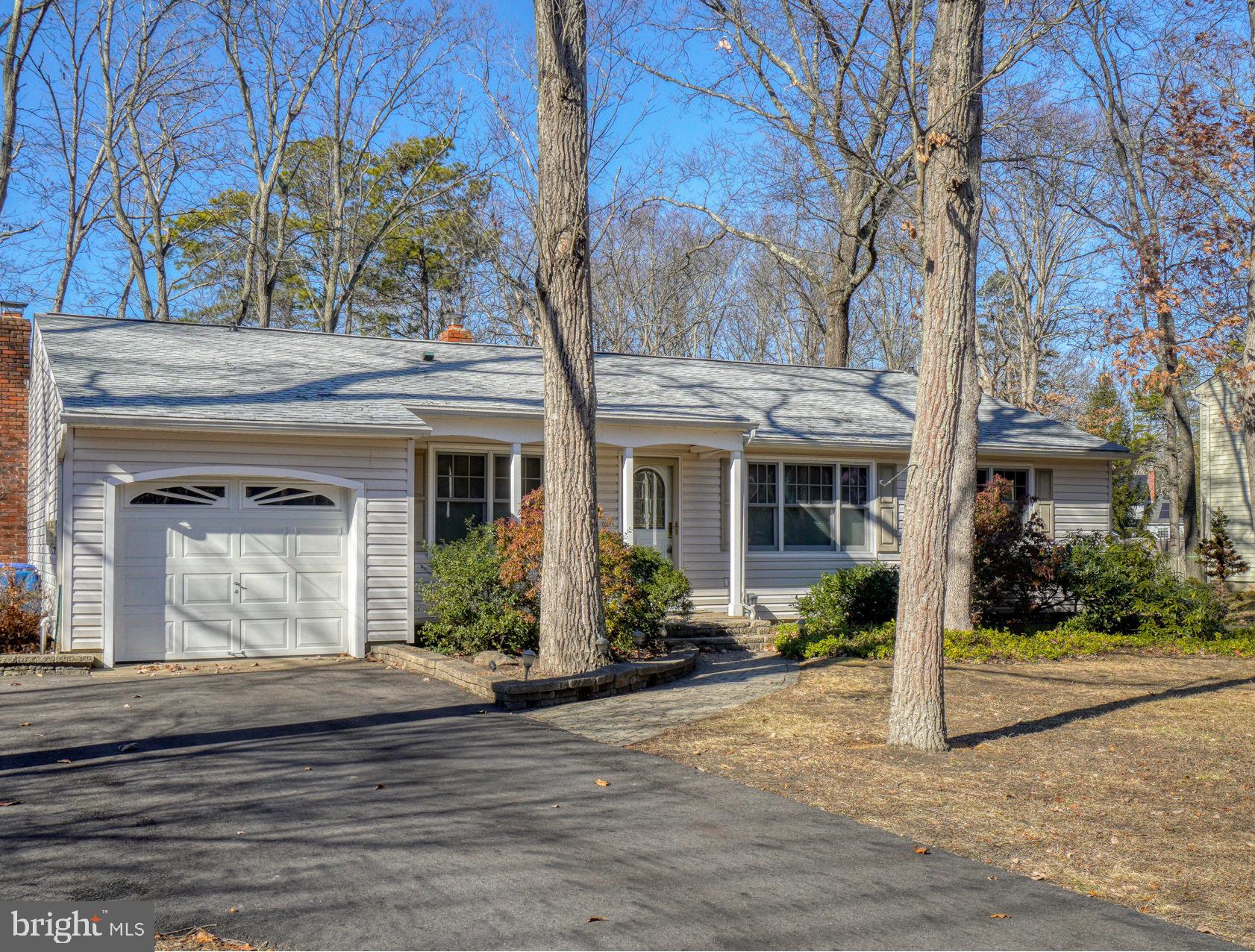 20 Oniontown Road Medford, NJ 08055 - Photo 3 of 47 a front view of a house with garden