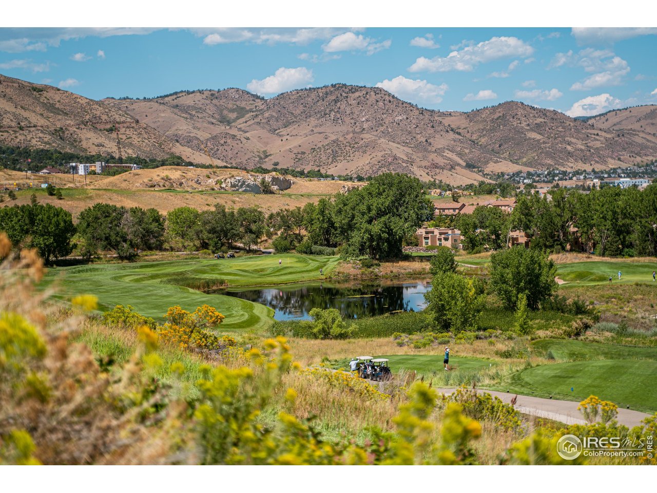 14467 Anvil Way Golden, CO 80403 - Photo 24 of 32 a view of a town with mountains in the background