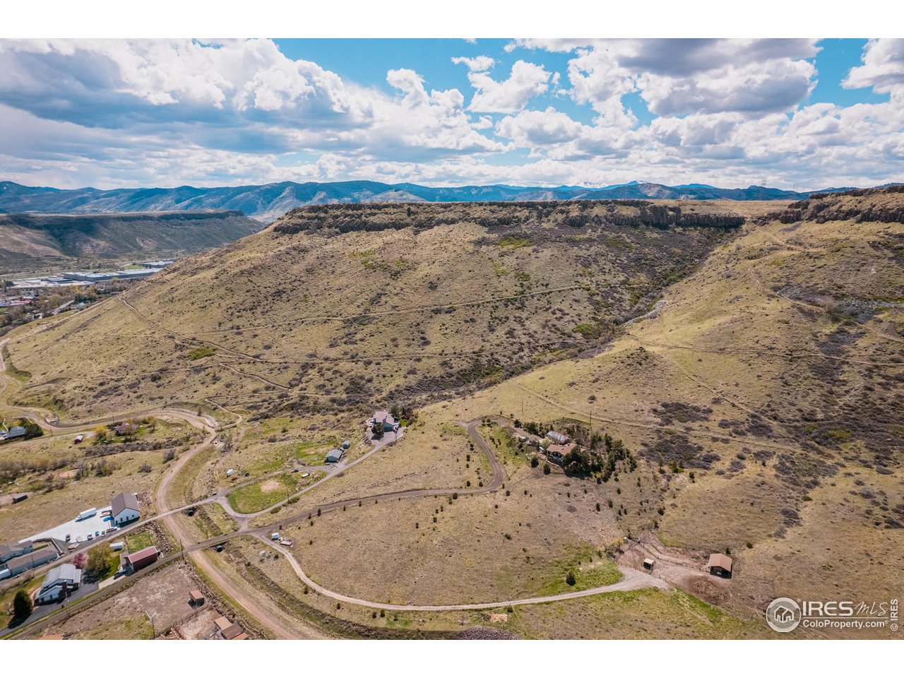 14467 Anvil Way Golden, CO 80403 - Photo 28 of 32 Miles of hiking and biking trails lace across Table Mountain, offering panoramic views, open terrain, and a front-row connection to Golden's rugged beauty-right outside your door.