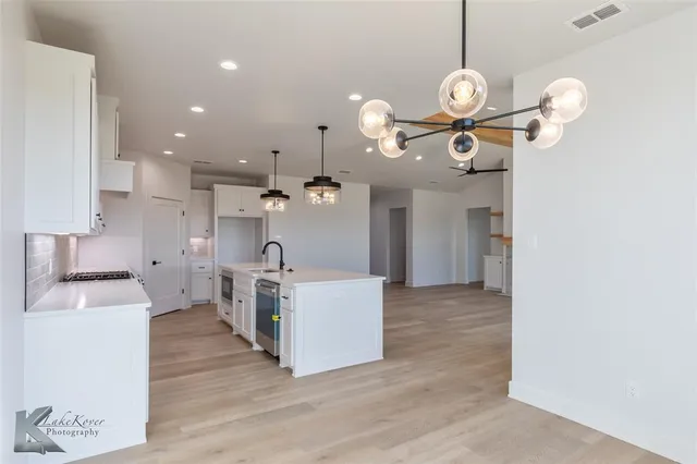 a white tub sitting in a bathroom