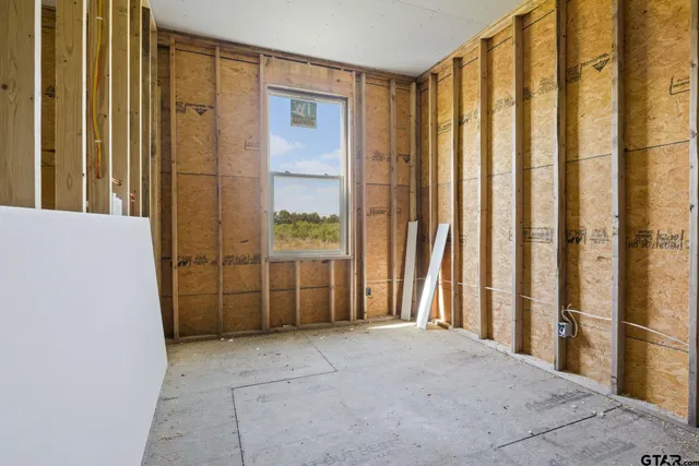 a view of a bathroom with a glass door