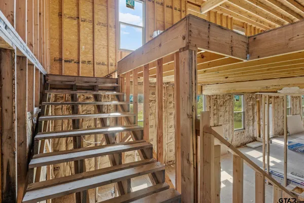a view of a room with staircase