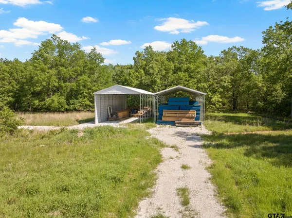 a view of a lake with a houses