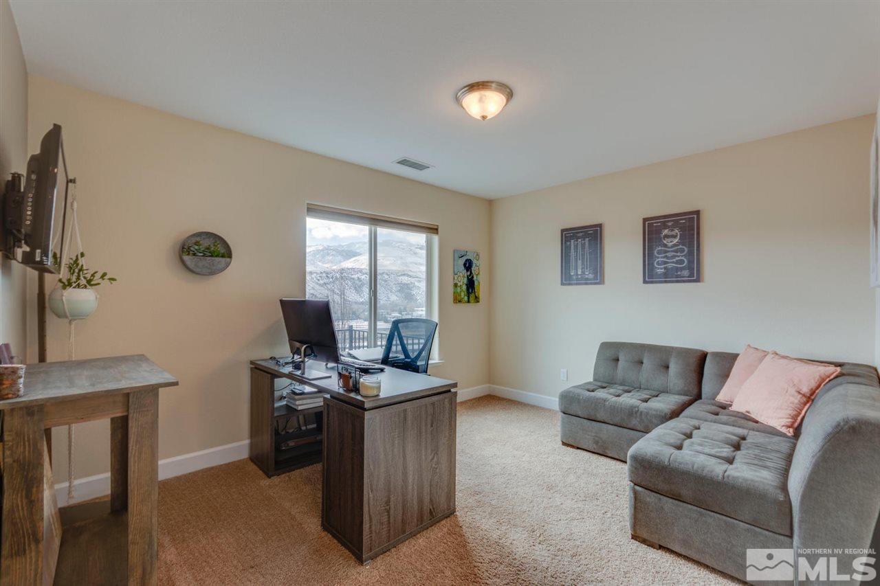 195 Anselmo Drive Reno, NV 89523 - Photo 10 of 20 a living room with furniture and a flat screen tv