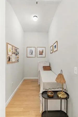 a living room with furniture and next to a window