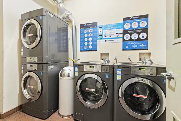 a view of livingroom with washer and dryer