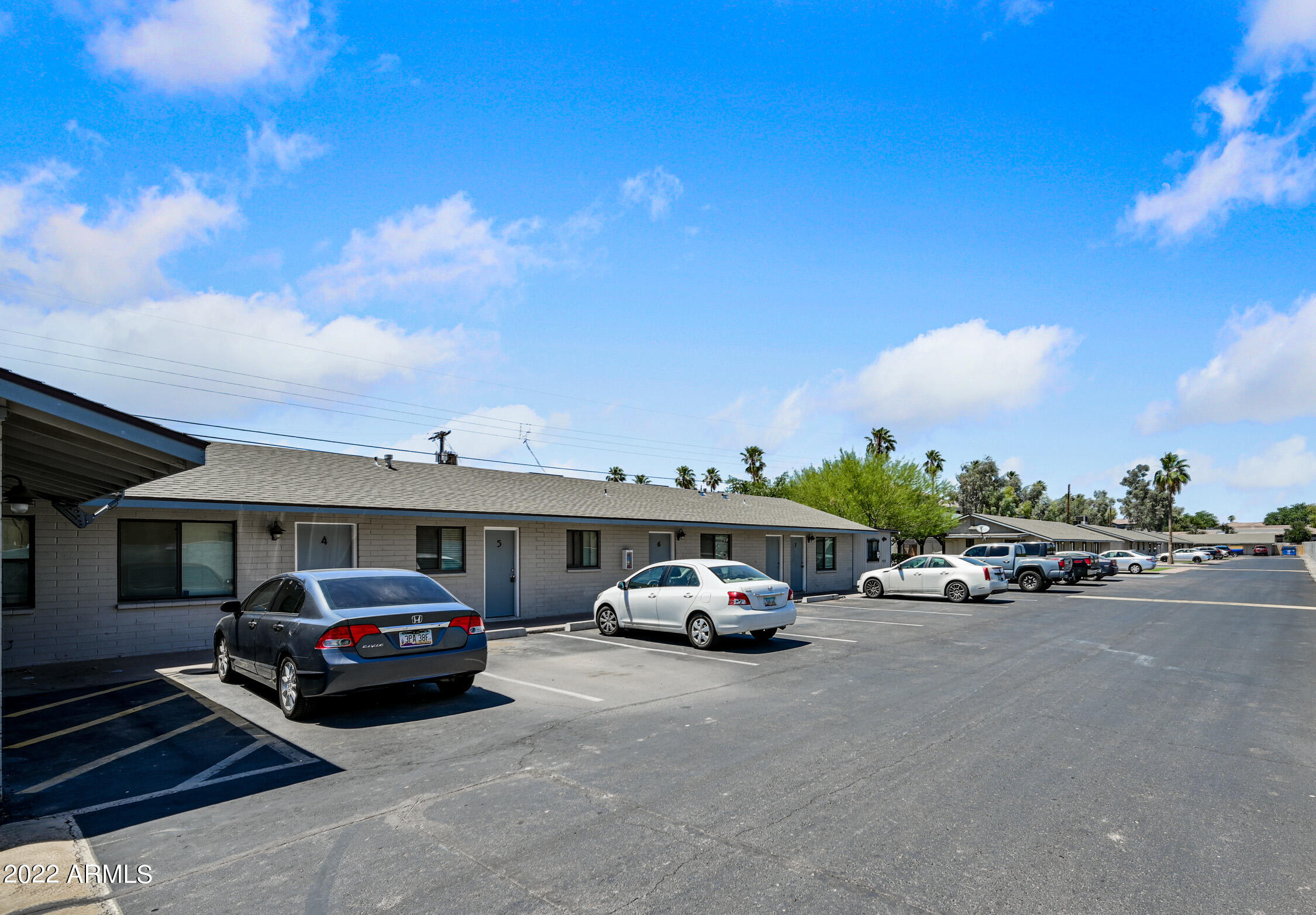 1744 West Glendale Avenue, Unit 1 Phoenix, AZ 85021 - Photo 2 of 12 a car parked in front of a house