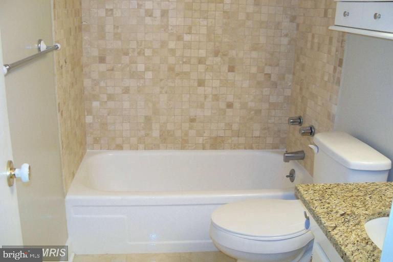 1800 R Street Northwest, Unit 604 Washington, DC 20009 - Photo 11 of 17 Elegant bathroom with mosaic tiles.