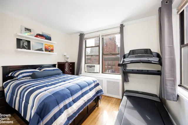 a kitchen with white cabinets and a stainless steel appliances